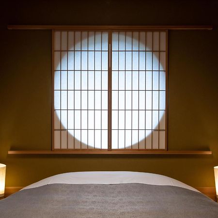 Itsukushimahigashimonzen Kikugawa Hotel Hatsukaichi Bagian luar foto