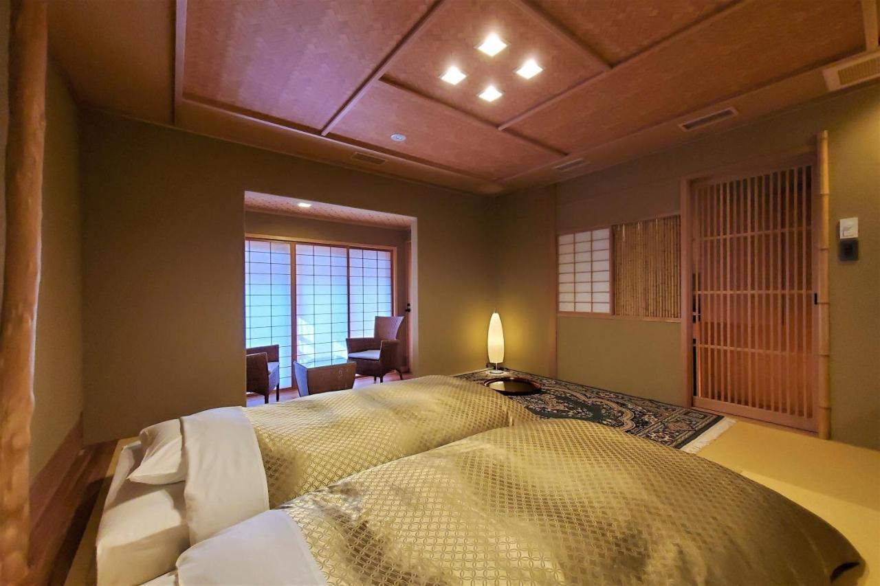 Itsukushimahigashimonzen Kikugawa Hotel Hatsukaichi Bagian luar foto