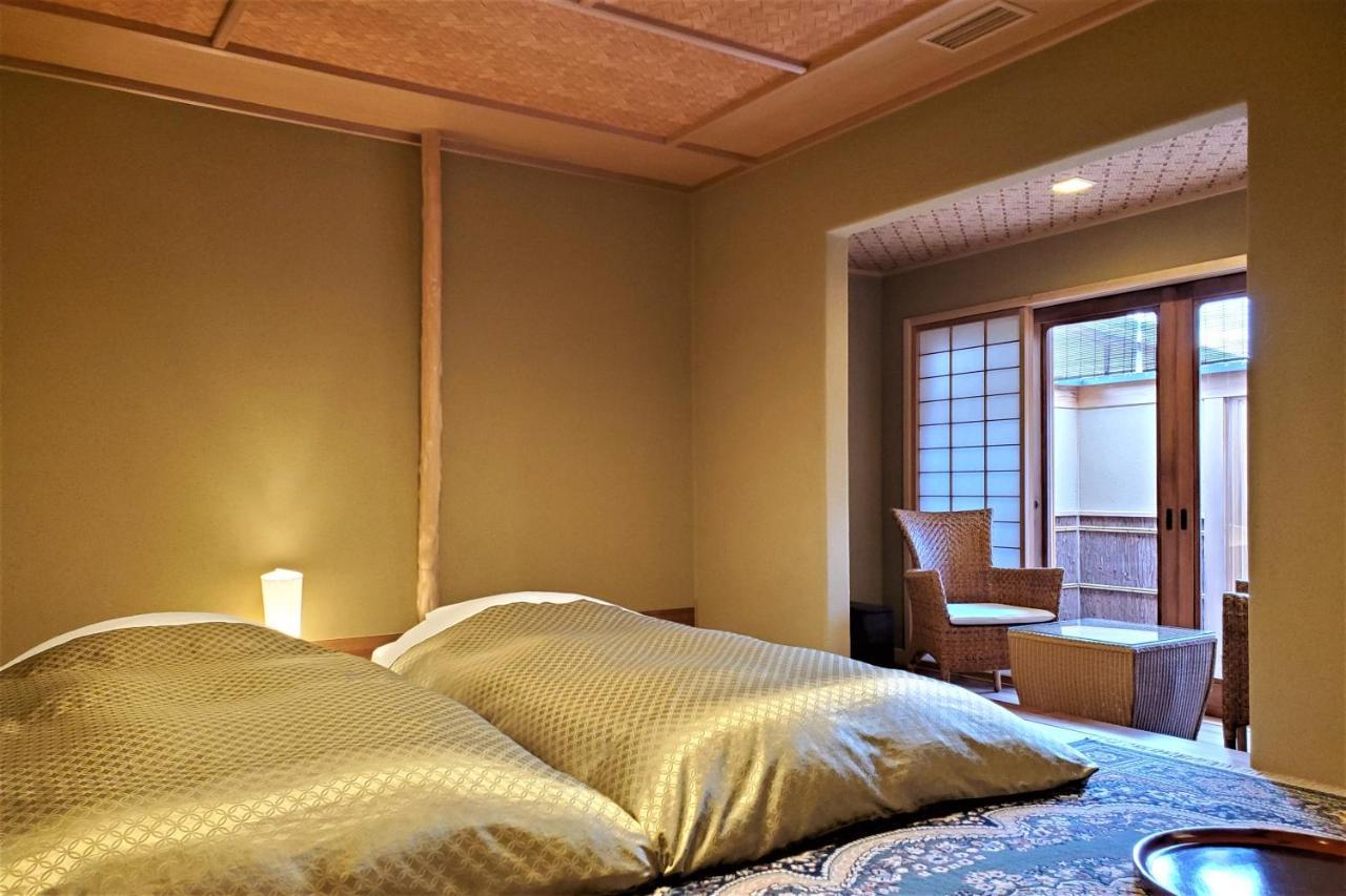 Itsukushimahigashimonzen Kikugawa Hotel Hatsukaichi Bagian luar foto